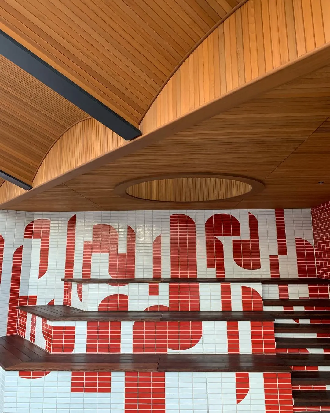 Exterior Pedestrian Lounge, tile art at Aoyama Building, Tokyo